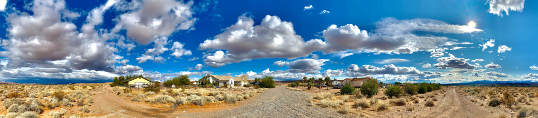 Desert, skies, houses, roads in Overton, Nevada