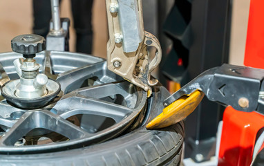 Tire changer machine in a car service center