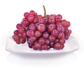 Grape on plate  isolated on white background.