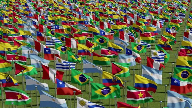 View from above on the  South America countries flags waving in the wind on green grass. 3d rendering animation.