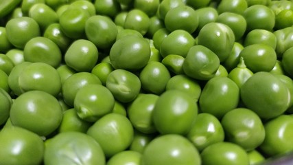 Pea fresh vegetable very green healthy and full of vitamins in nature and in the form of background. 