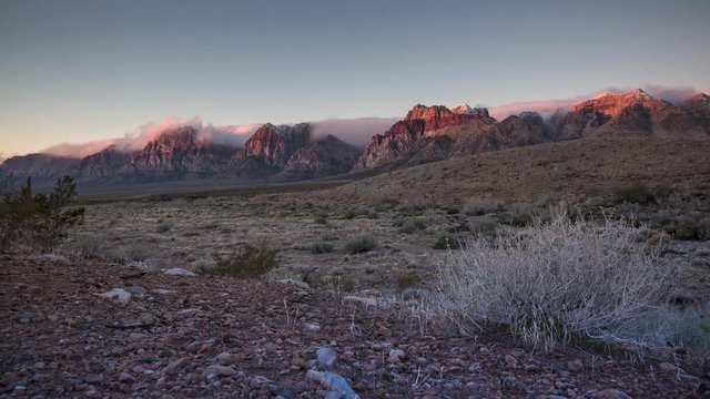 Sun Rising On the Mountains at Red Rock State Park in Las Vegas Nevada Moving time lapse