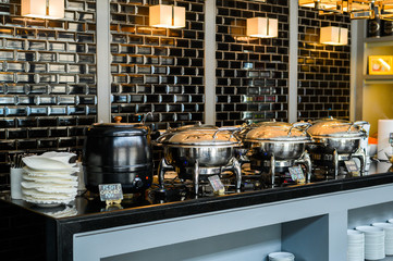 Buffet Table with Row of Food Service Steam Pans