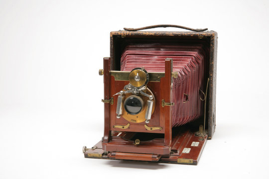 Vintage large-format view camera with bellows extended.  Lens has cool valves and steam-punk look