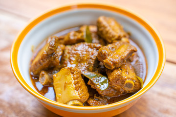pork bone with spices curry paste soup