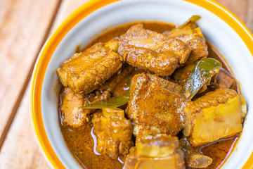 pork bone with spices curry paste soup