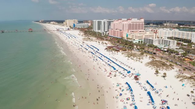 Aerial Flyback Of Busy Beach On Florida Gulf Coast Sunny