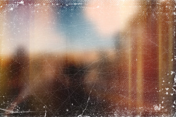 Vintage old abstract distressed blurred retro photo bokeh background with scratches, defects and light leaks