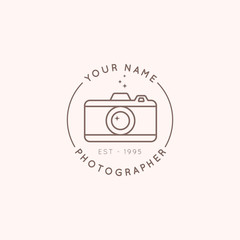 Linear logo of the photographer in a trending minimal linear style. Round emblem the camera. Vector Abstract symbol