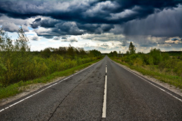 Highway in cloudy weather in spring.