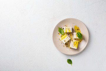 Feta cheese on plate top view