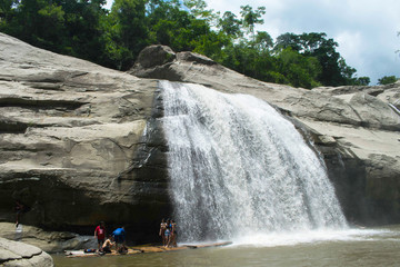 Group pf tourist taking photos and selfies at the Tangadan falls in La Union Pangasinan Philippines