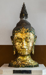 Buddha statue inside Wat Phra Mongkhon Bophit, a Buddhist temple of archaeological park, Ayutthaya, Thailand