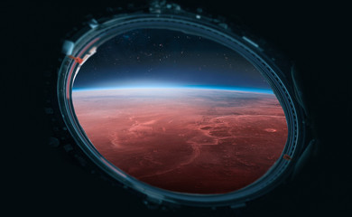 Orbit of planet Mars. View from porthole of spaceship. Expedition and colonization of Mars. Deep space. Elements of this image furnished by NASA
