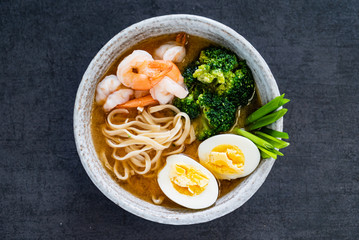 asian noodle soup with shrimps and egg