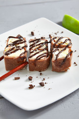 Chocolate pancake in ceramic white plate