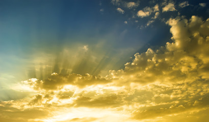 Naklejka na ściany i meble sunlight in gold cloud with blue sky