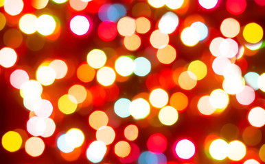 colorful bokeh on red background