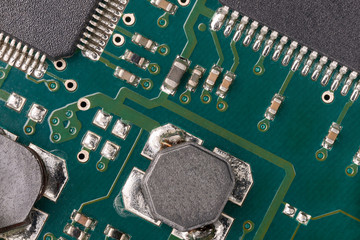 printed green computer circuit board macrophoto