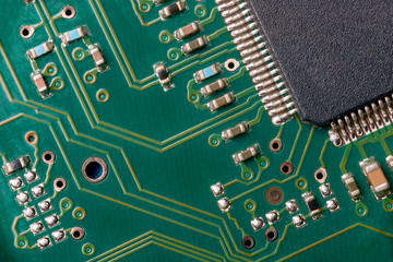 printed green computer circuit board macrophoto