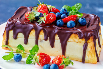 Rectangular Lviv syrnyk or cheesecake with berries