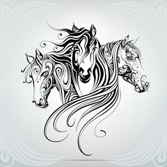 Heads of horse are in a decorative pattern