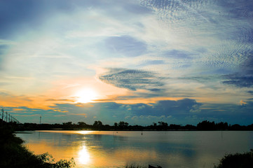 landscape sun down reflect light on lagoon