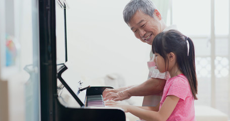 grandpa teach girl play piano © ryanking999
