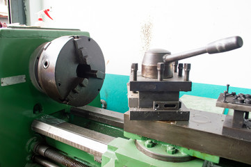 chuck of green lathe machine in factory