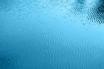 Fototapeta na wymiar water wave in blue river