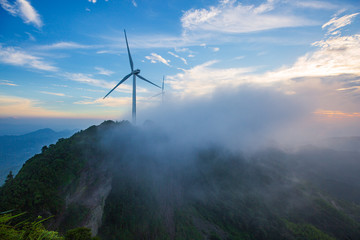 Fototapeta na wymiar Windmill in the rainy season in the missing mountain in Heyuan, Guangdong, China