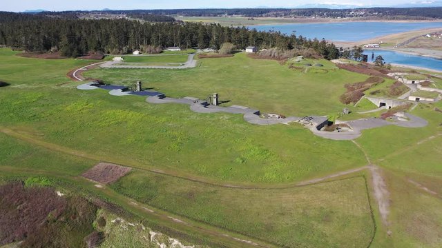 Aerial / drone footage of the batteries, Disappearing Guns, artillery of Fort Casey State Park on Whidbey Island near Seattle, Washington during the COVID-19 pandemic closure