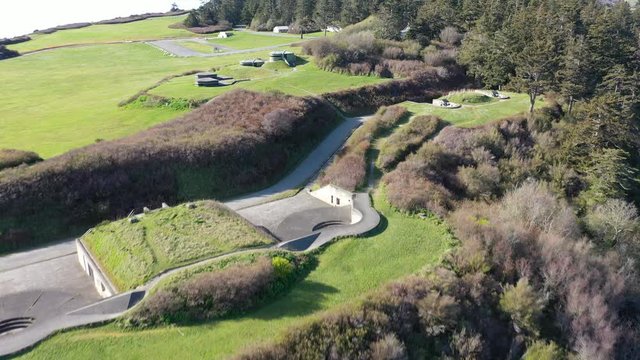 Aerial / drone footage of Fort Casey State Park with the Disappearing guns, artillery on Whidbey Island near Seattle, Washington during the COVID-19 pandemic closure
