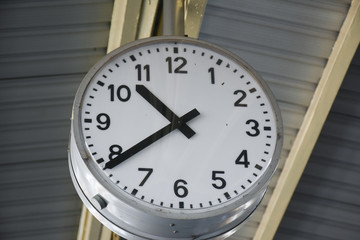 hanging clock in a train station