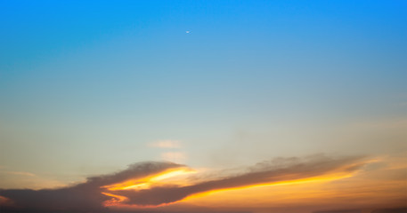 Fototapeta na wymiar twilight landscape sunset red sunbeam blue sky background