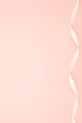 isolated pink satin silk atlas ribbon pink background