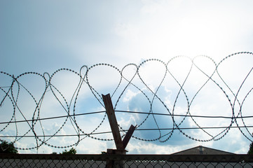 twist barbed wire with blue sky