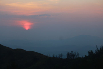 sunset in the mountains, in a cloudy sky, Kumaraparvatha, subrahmanya, Karnataka 