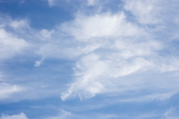 Naklejka na ściany i meble beautiful white clouds and blue sky background