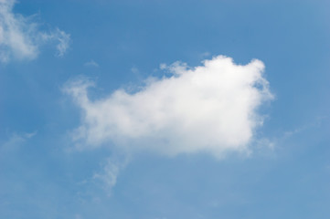 one white cloud on blue sky