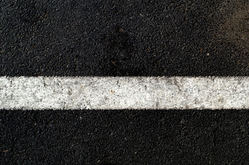 Fototapeta premium white on asphalt floor in parking