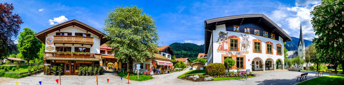 Bayrischzell, Germany - May, 19: old bavarian buildings and church at the old town of Bayrischzell on May 19, 2020