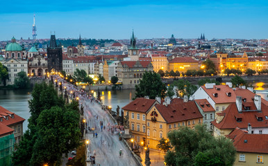 Naklejka na ściany i meble Prague with red roofs from above summer day at dusk, Czech Republic