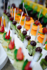 Delicious varied desserts at the wedding table.