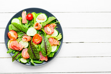Vegetable salad with salmon