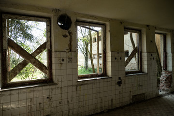 exploring the ruin of an abandoned country house