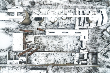 Old abandoned cement factory winter snow time in Bedzin Poland aerial drone photo