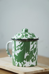 indonesian stainless steel vintage teacup on the table 