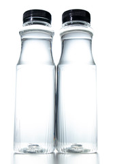 Plastic water bottle with black screw cap on a white background