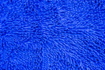 Fototapeta na wymiar Close up blue doormat carpet texture